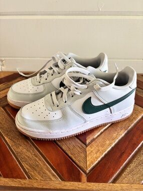 Youth Nike Low-Top Sneakers — White with Green Swoosh